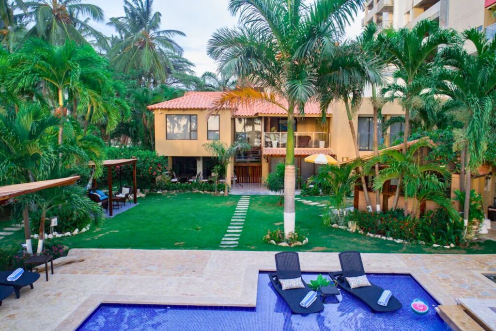 rear view of Casa Verano Beach hotel and pool