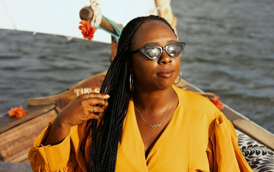 close-up of Simone Cheri looking at the sunset on a dhow boat ride in Lamu